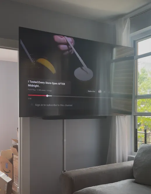 Corner-mounted TV in living room